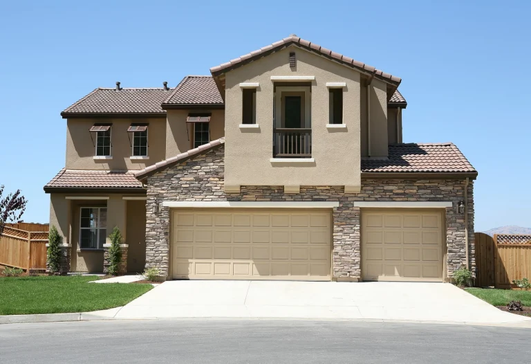 modern home with stone front wall and stucco Northbrook finishing